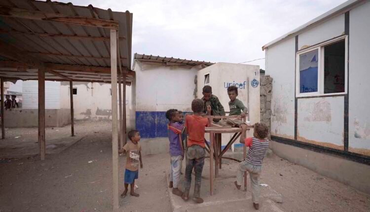 Displaced children playing together [2]