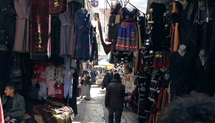 People walking in streets of Sana'a old City