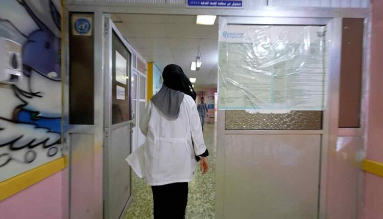A nurse walking inside malnutrition section