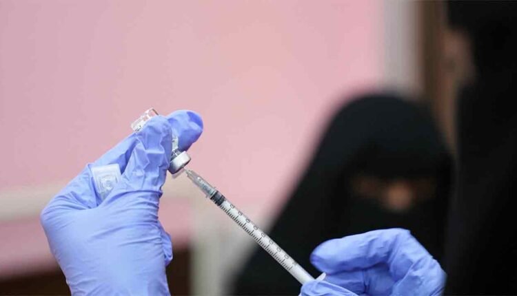 Doctor preparing an injection