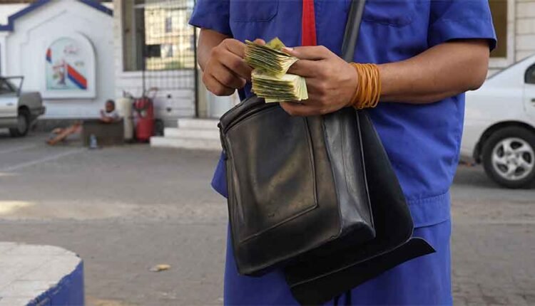 Counting money after refilling a car