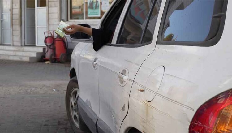 Filling a car with petrol and getting paid [2]