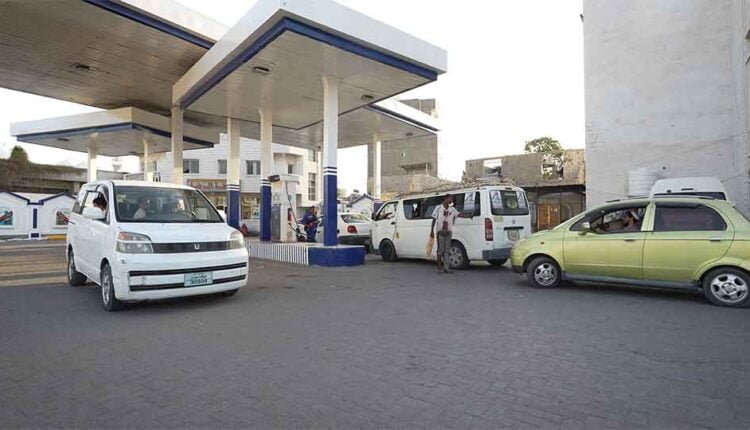 Cars entering a filling station [3]