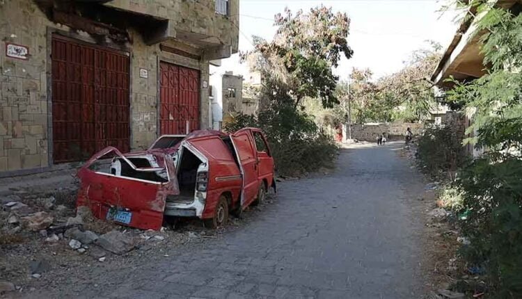 Destroyed car by heavy clashes