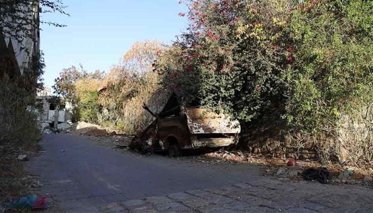 Destroyed cars due to heavy clashes