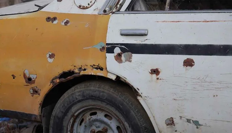 Destroyed taxi by heavy clashes