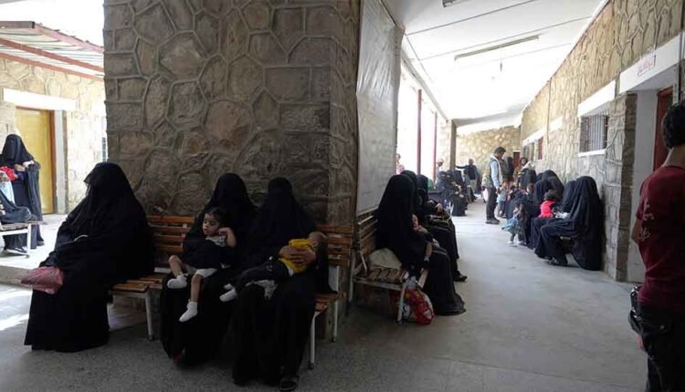 Mothers waiting for their turn [crowded hospital]