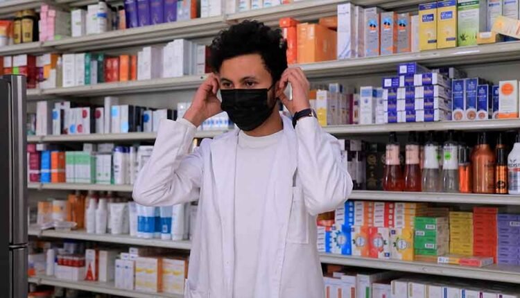 Wearing a mask inside a pharmacy