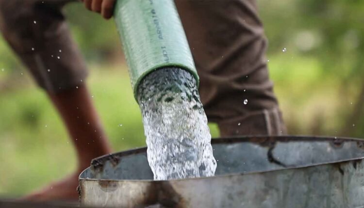 Filling up a water tank truck [2]