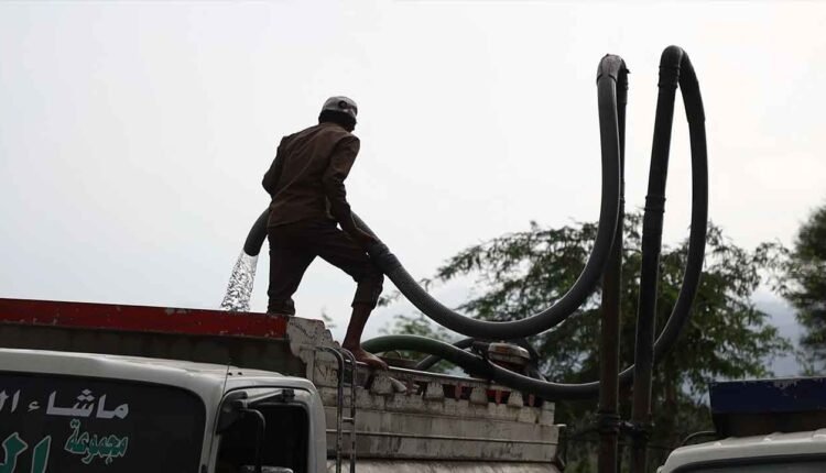 Filling up a water tank truck [3]