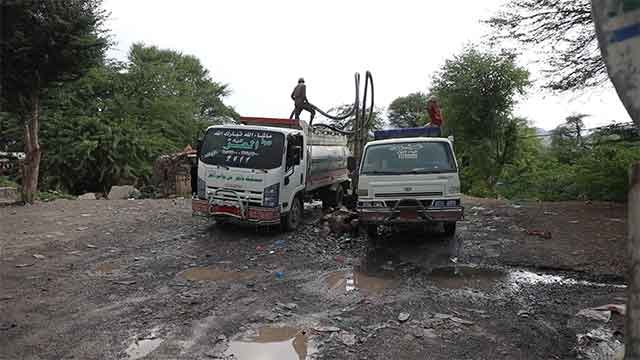 Filling up a water tank truck [7]