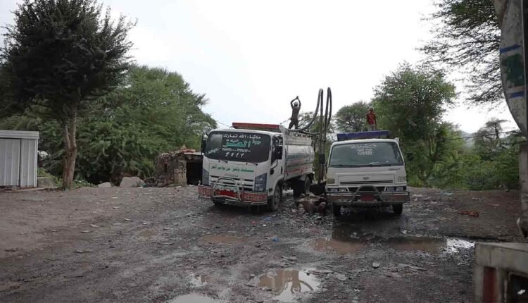 Filling up a water tank truck [5]